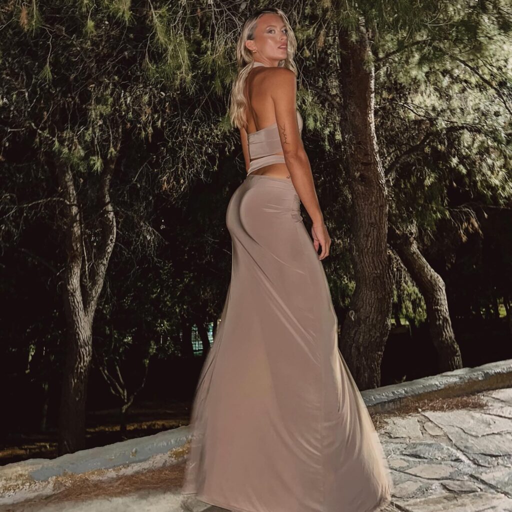 Photo by ⓒⓗⓔⓡⓡⓨ 🍒🧿🐷 on June 28 2024. May be an image of 1 person blonde hair slip dress gown and outdoors