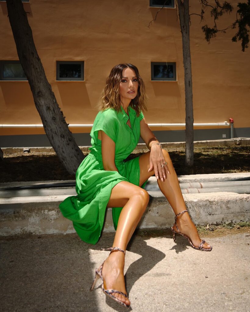 Photo shared by BETTY ΜΑGGIRA on June 27 2024 tagging @nasos asimakopoulos @tzela @t.nakis and @klimentinipapadimitriou. May be an image of 1 person slingback shoes and dress