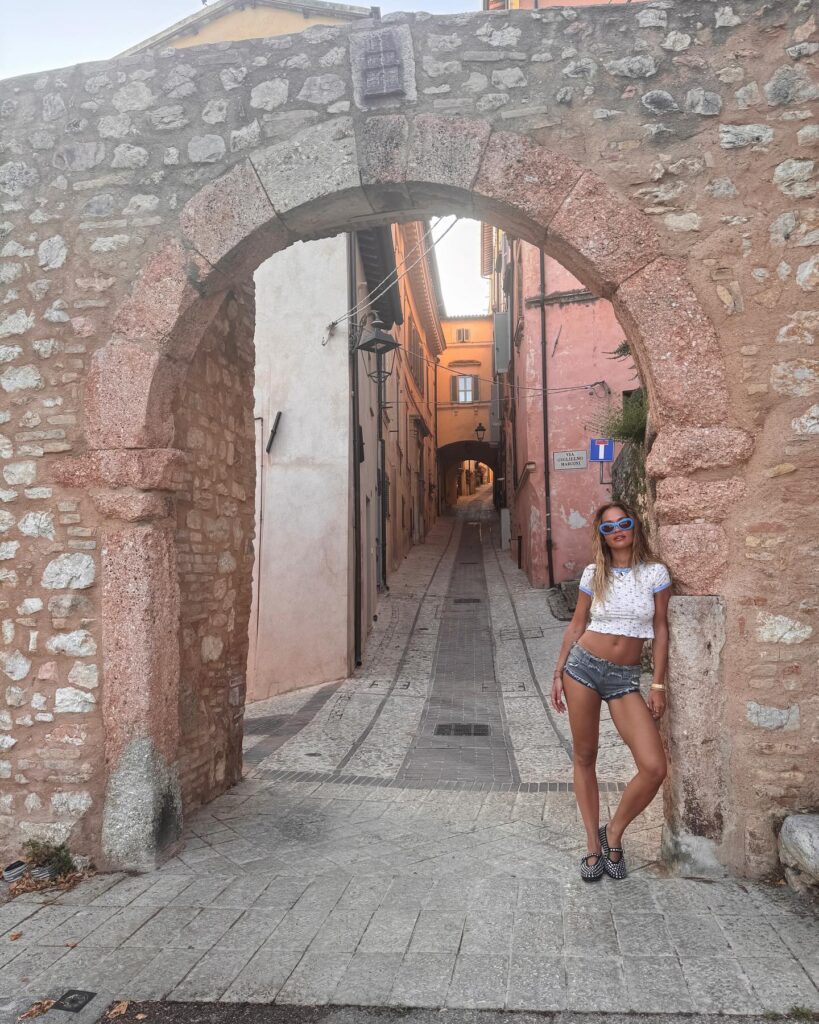 Photo by RITA ORA on July 21 2024. May be an image of 1 person Stari Most and Camogli