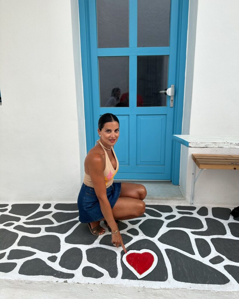 Photo by stam tsimtsili on July 11 2024. May be an image of 2 people sarong and Santorini