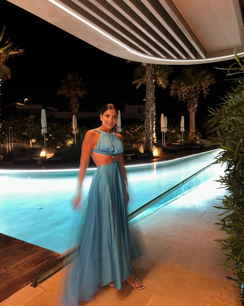 Photo shared by stam tsimtsili on July 20 2024 tagging @lachaine official. May be an image of 1 person gown dress and pool