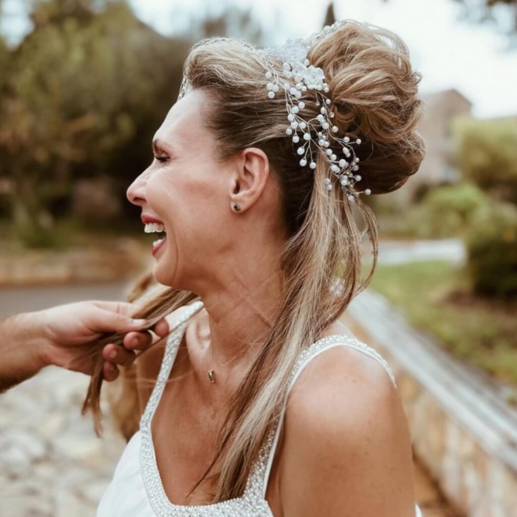 Photo by Evelina Papoulia 1111 🙏 on August 21 2024. May be an image of 1 person braids barrette and wedding